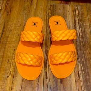 Orange braided strap sandals